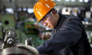 Technician working in factory