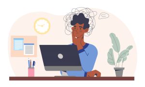 Illustration of a person looking worried while using a laptop at a desk with a plant and pen cup.